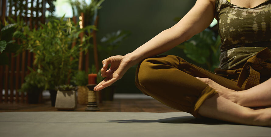 woman practicing yoga to naturally balance hormones and improve female libido